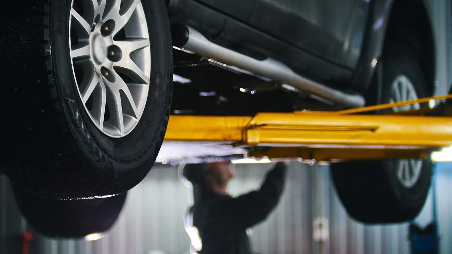 A car up on a lift